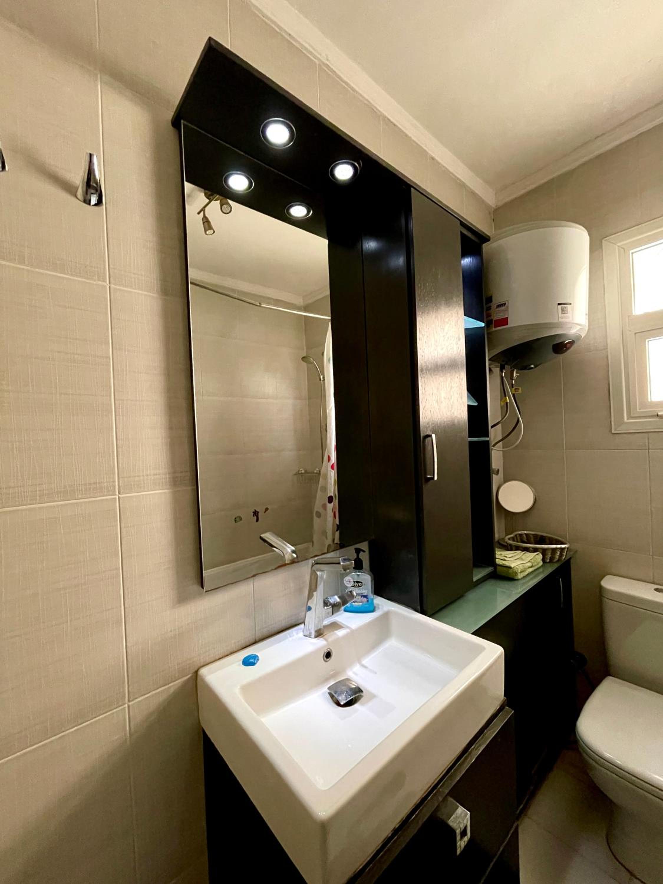 2BR Apartment with Private Garden in Downtown Rehab Near Malls