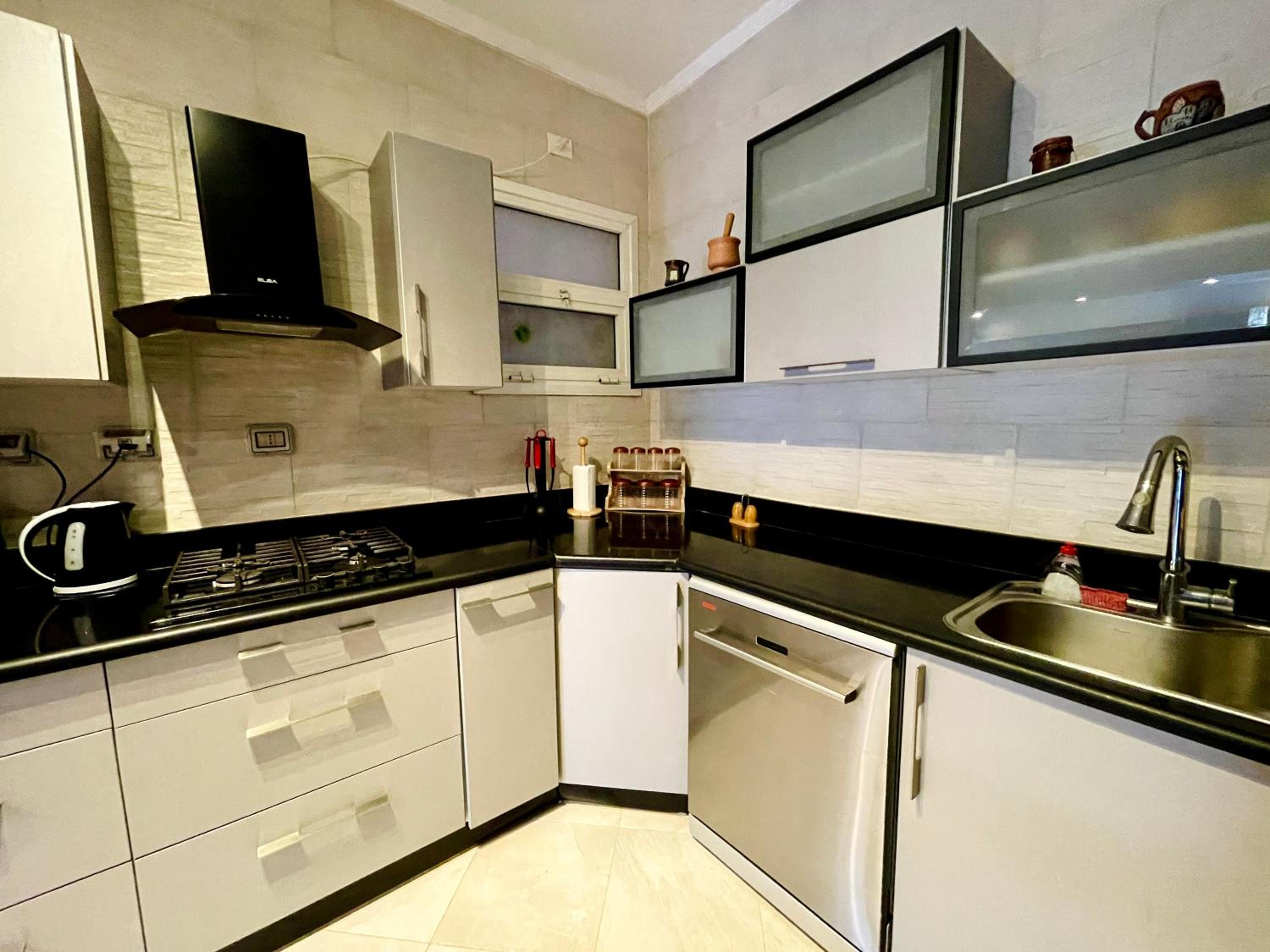 2BR Apartment with Private Garden in Downtown Rehab Near Malls