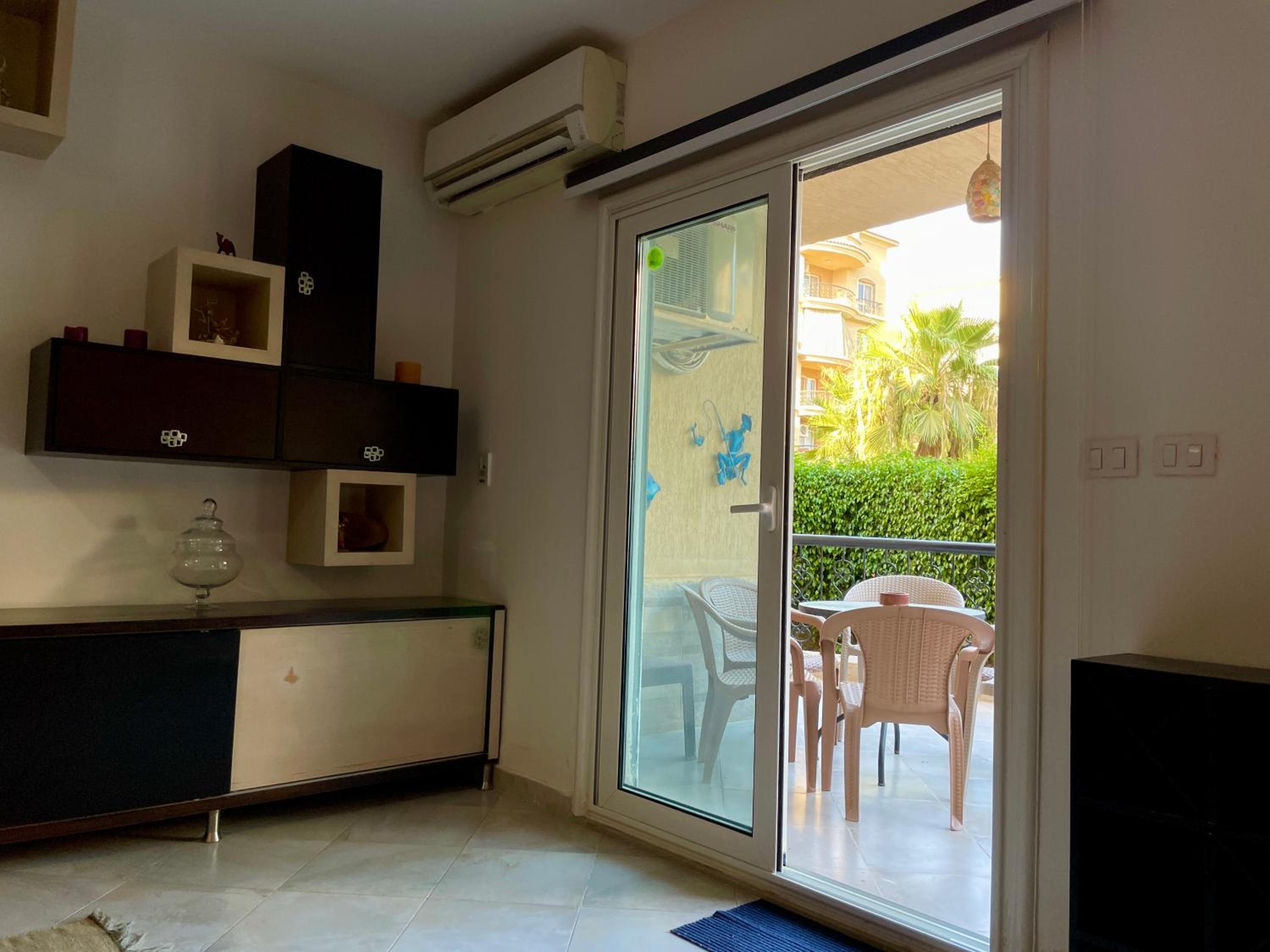 2BR Apartment with Private Garden in Downtown Rehab Near Malls