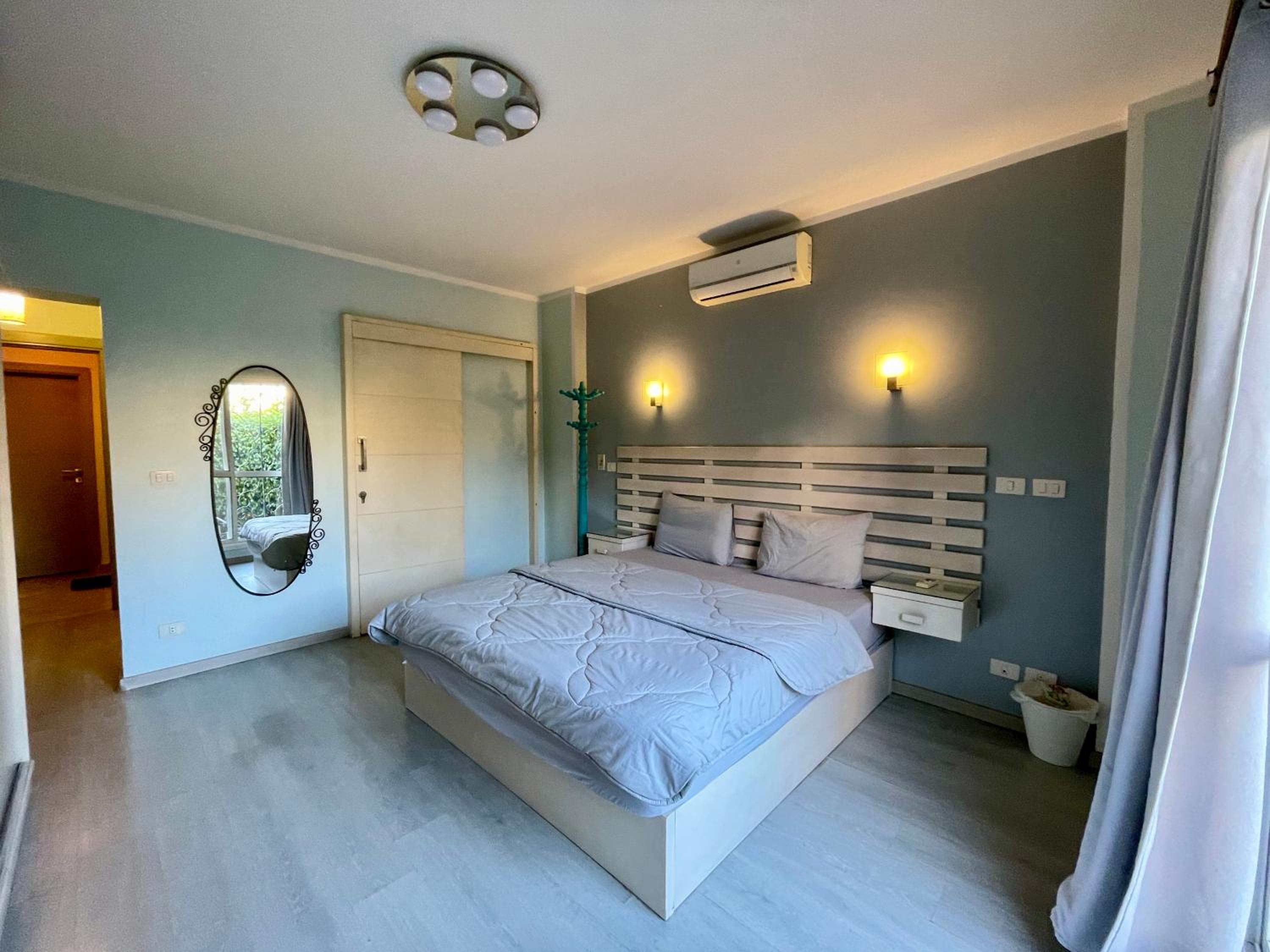2BR Apartment with Private Garden in Downtown Rehab Near Malls