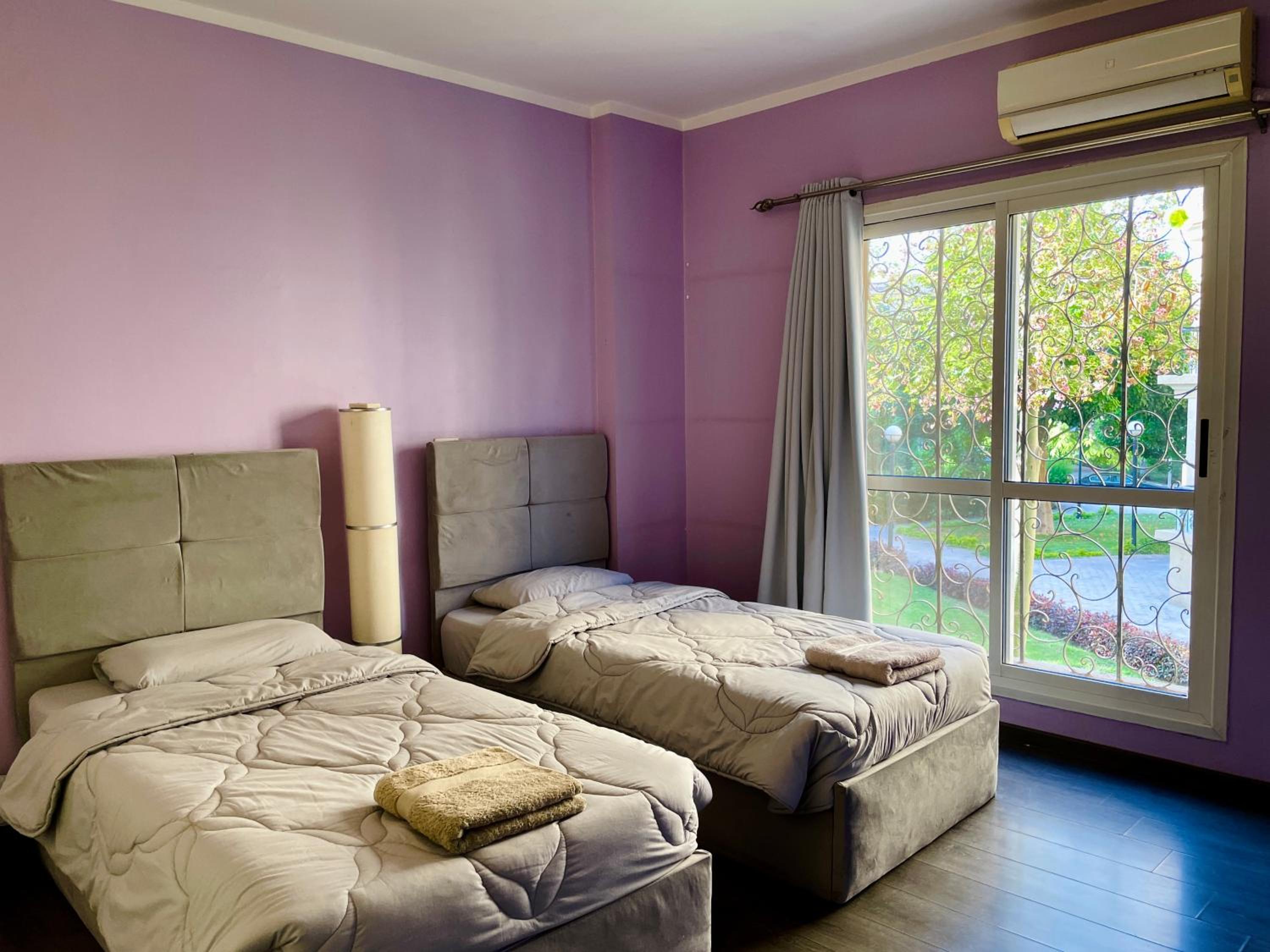 2BR Apartment with Private Garden in Downtown Rehab Near Malls