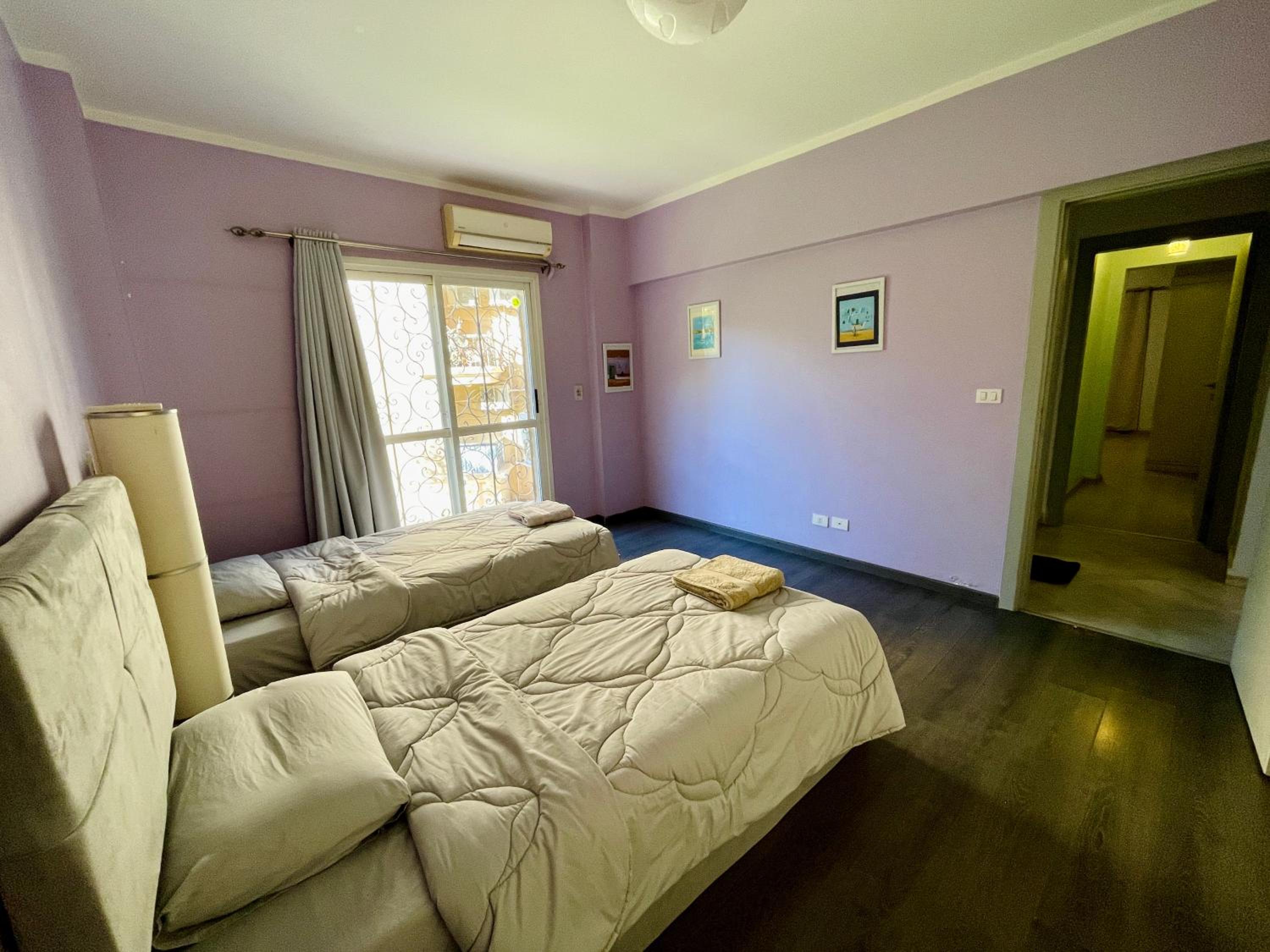 2BR Apartment with Private Garden in Downtown Rehab Near Malls