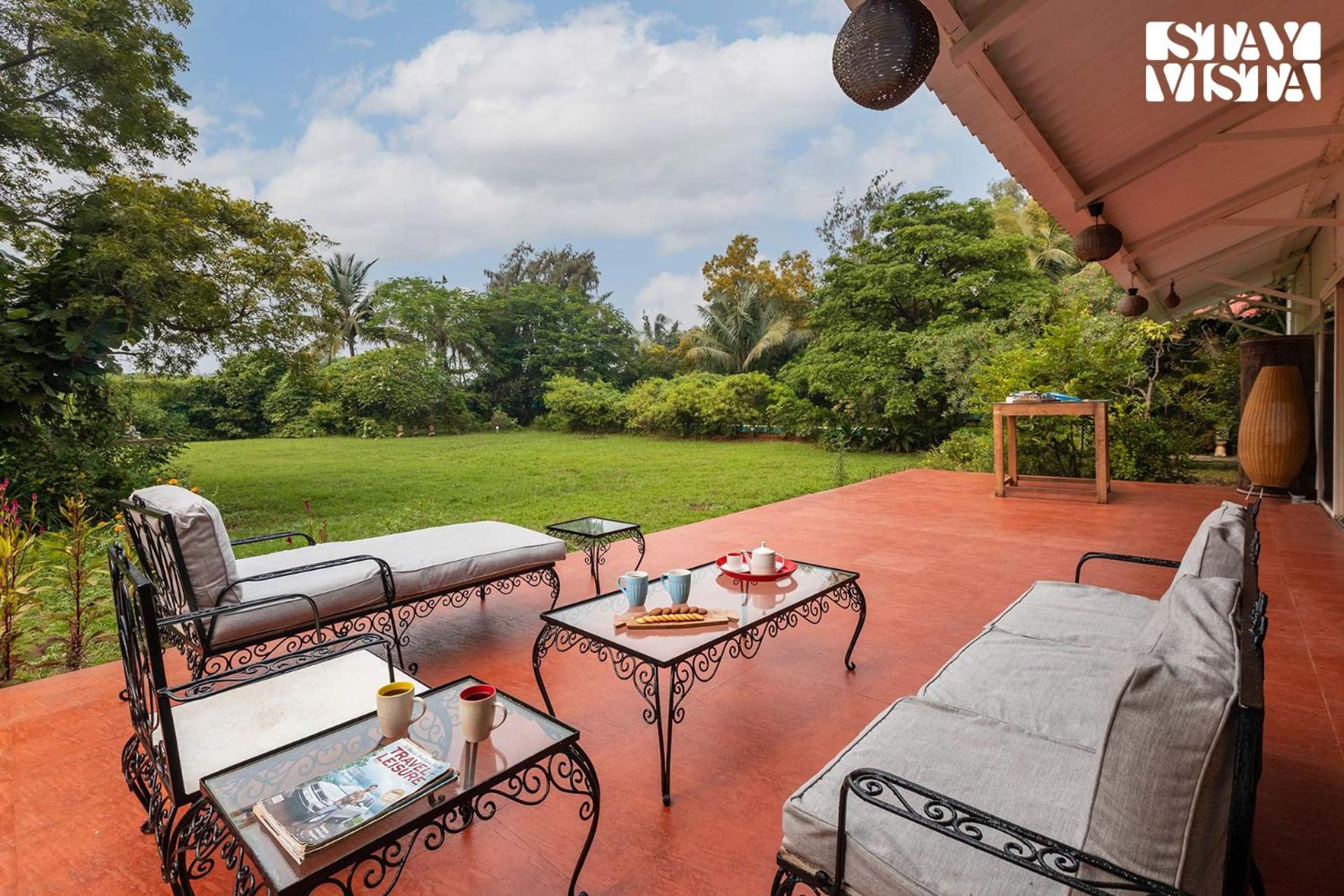 StayVista's Moonlit Trails - Pool-View Villa with Turf Near Mandwa Jetty view 2