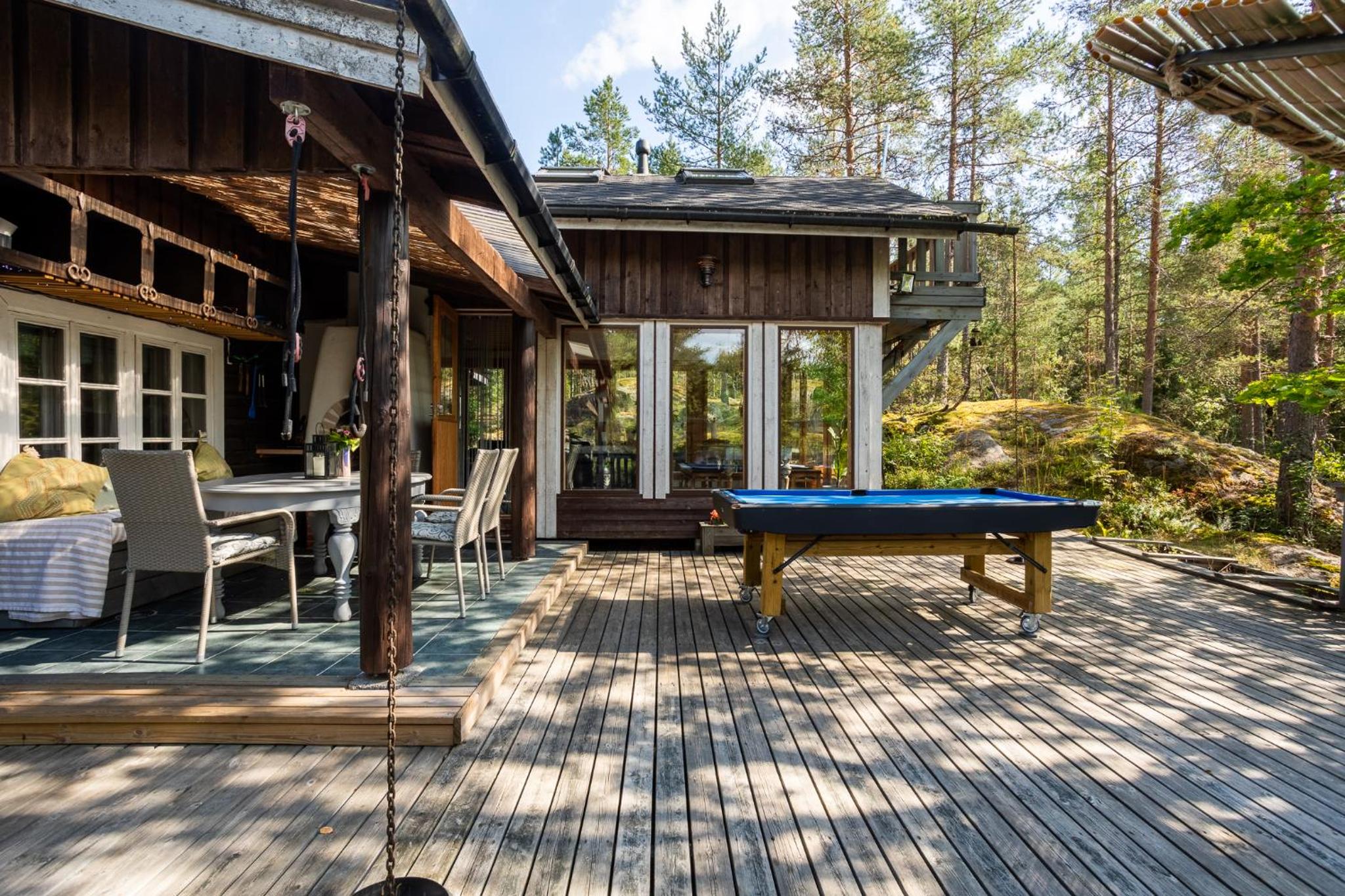 Sirpa's Artistic Nuuksio Retreat with Heated Pool