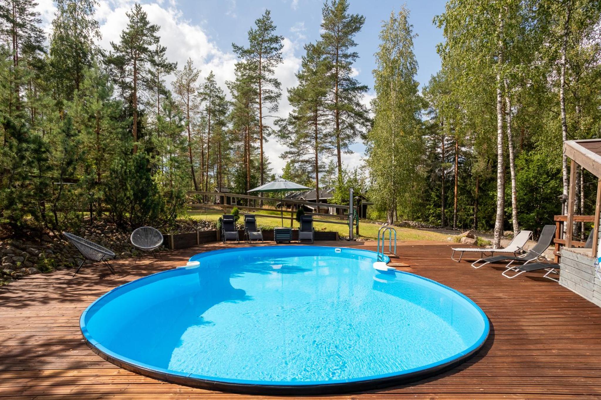 Sirpa's Artistic Nuuksio Retreat with Heated Pool