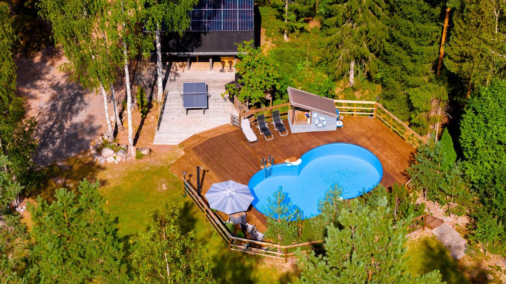 Sirpa's Artistic Nuuksio Retreat with Heated Pool