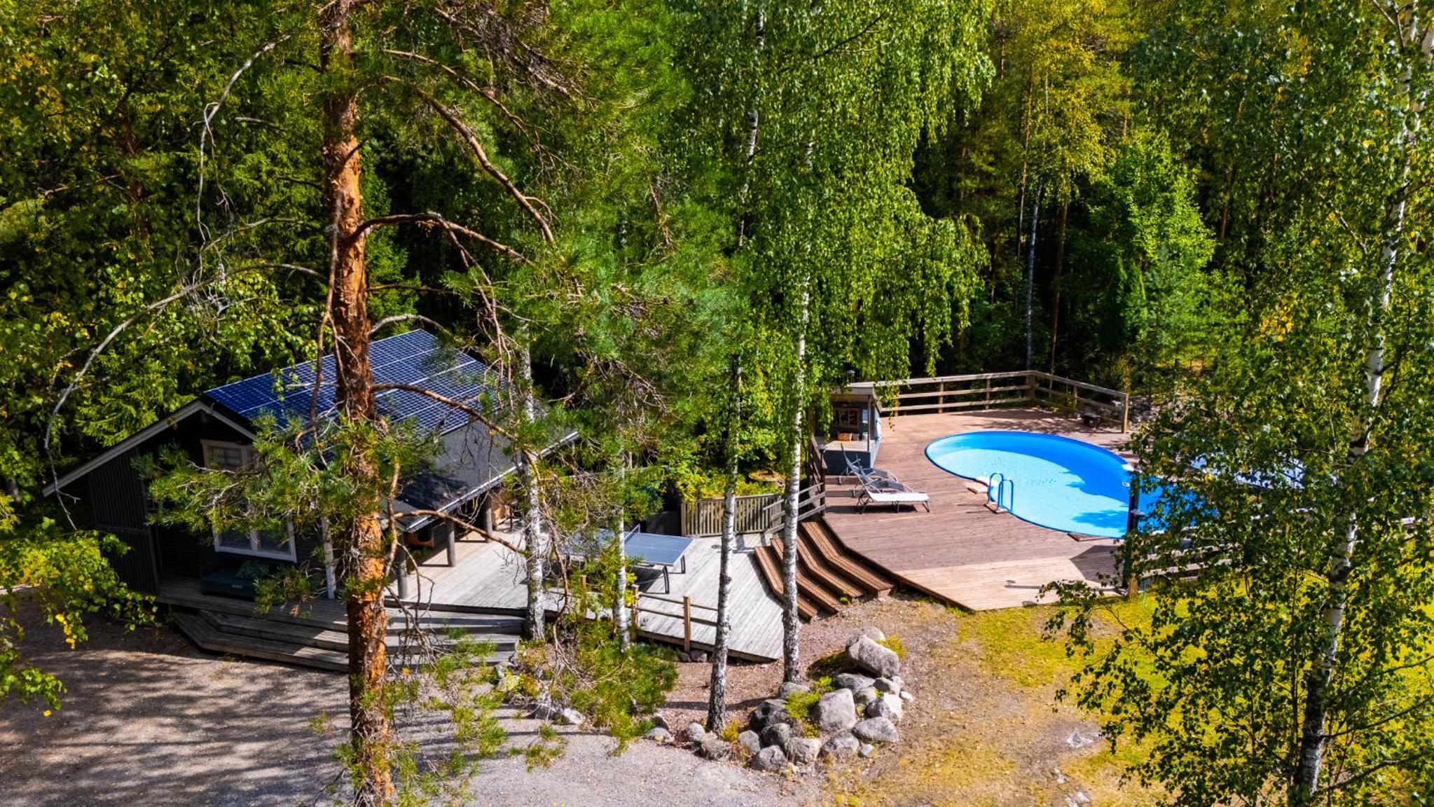 Sirpa's Artistic Nuuksio Retreat with Heated Pool