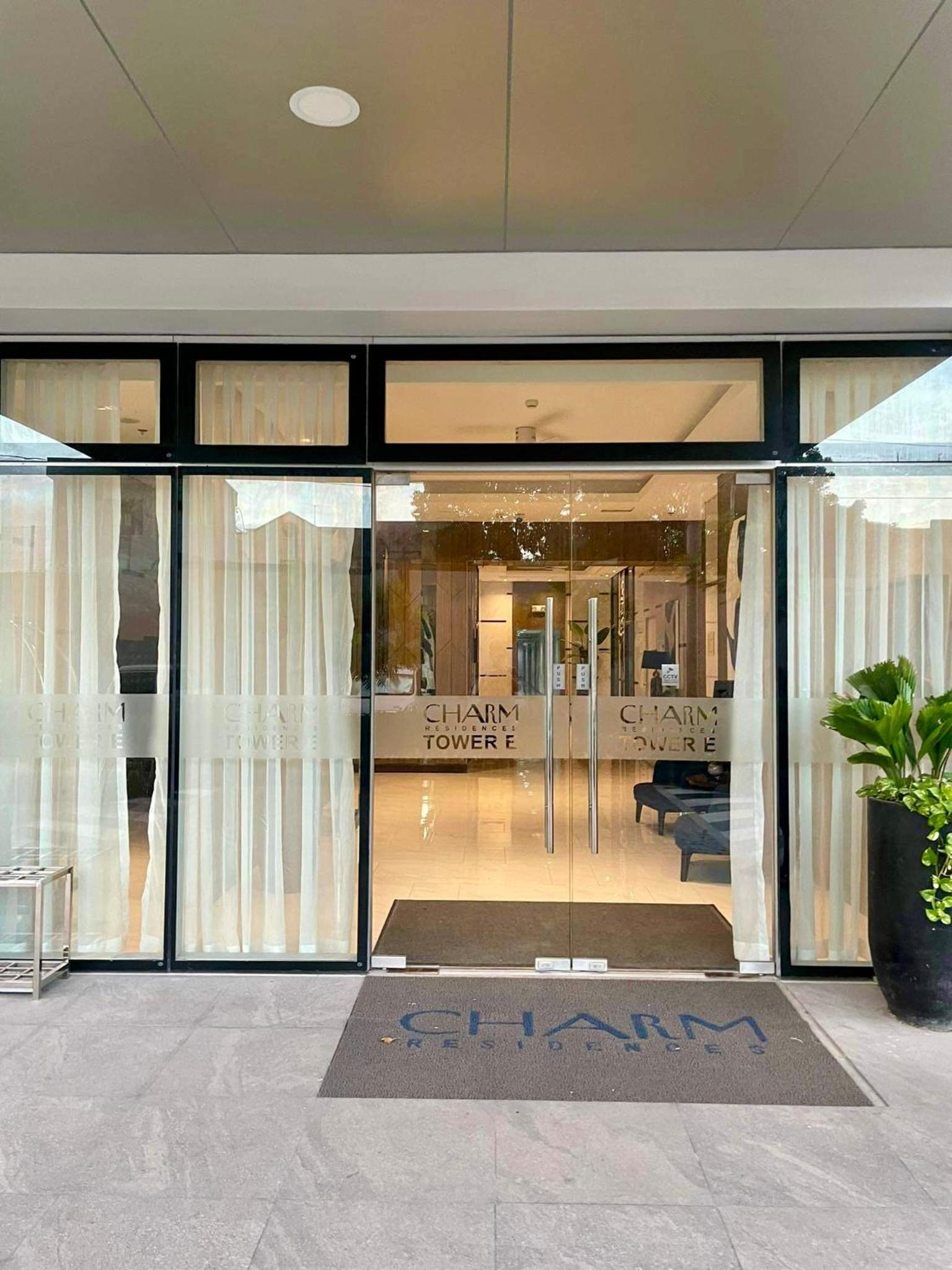 Urban Oasis 2BR Condo with Multiple Pools at SMDC Charm Residences view 3