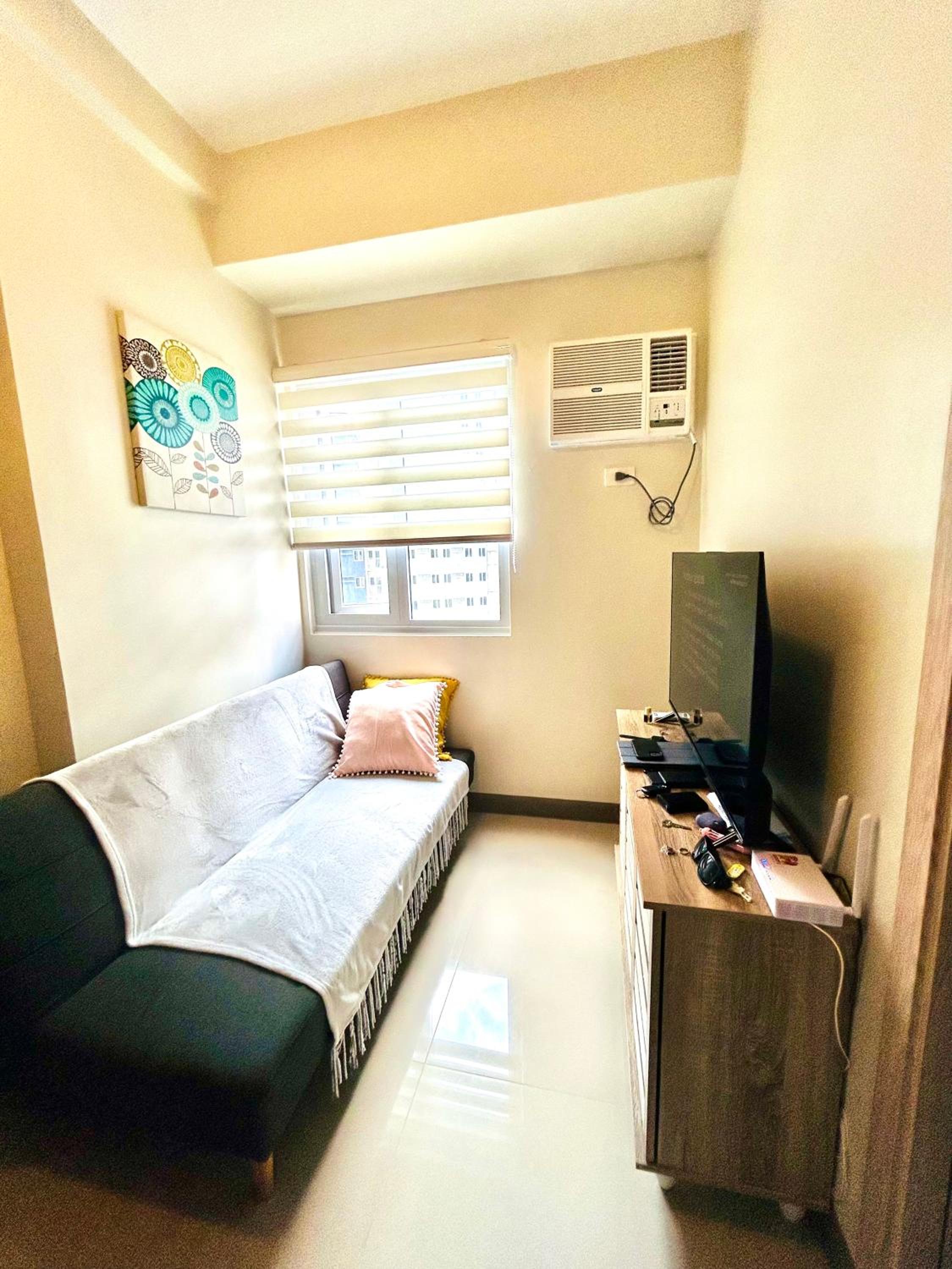 Urban Oasis 2BR Condo with Multiple Pools at SMDC Charm Residences view 4