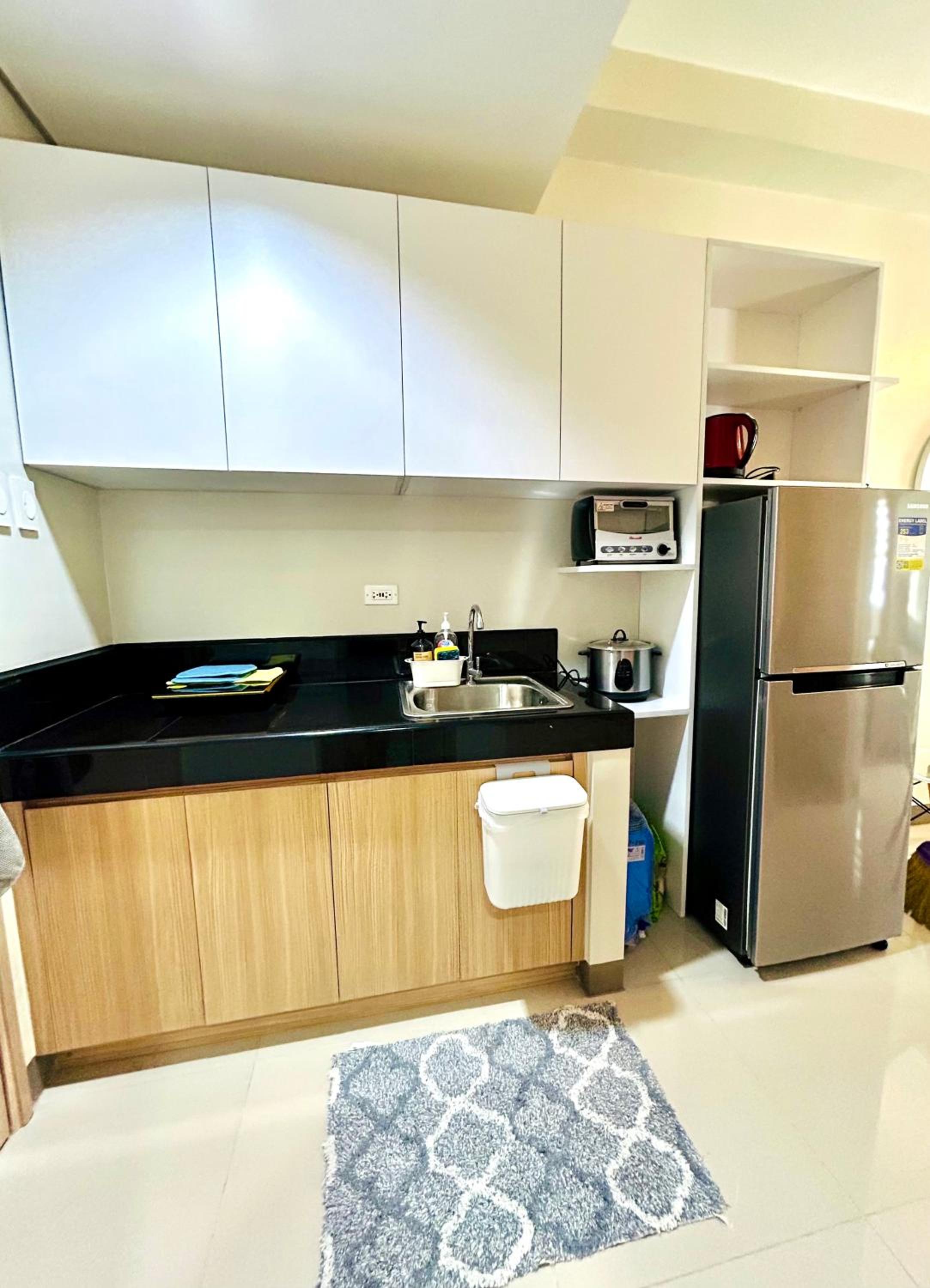 Urban Oasis 2BR Condo with Multiple Pools at SMDC Charm Residences view 5