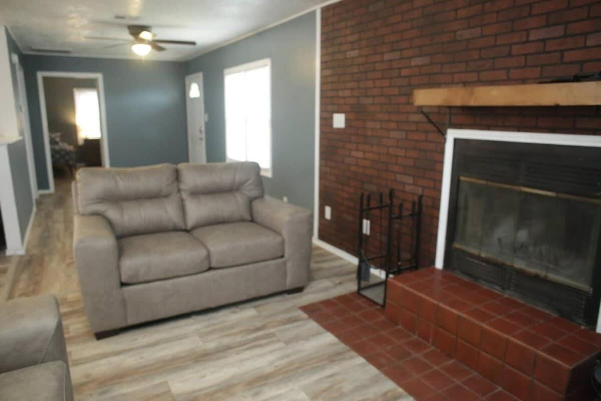 1 bedroom with a fireplace close to base view 2