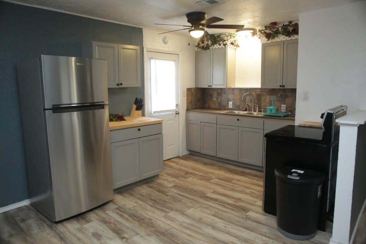 1 bedroom with a fireplace close to base view 4