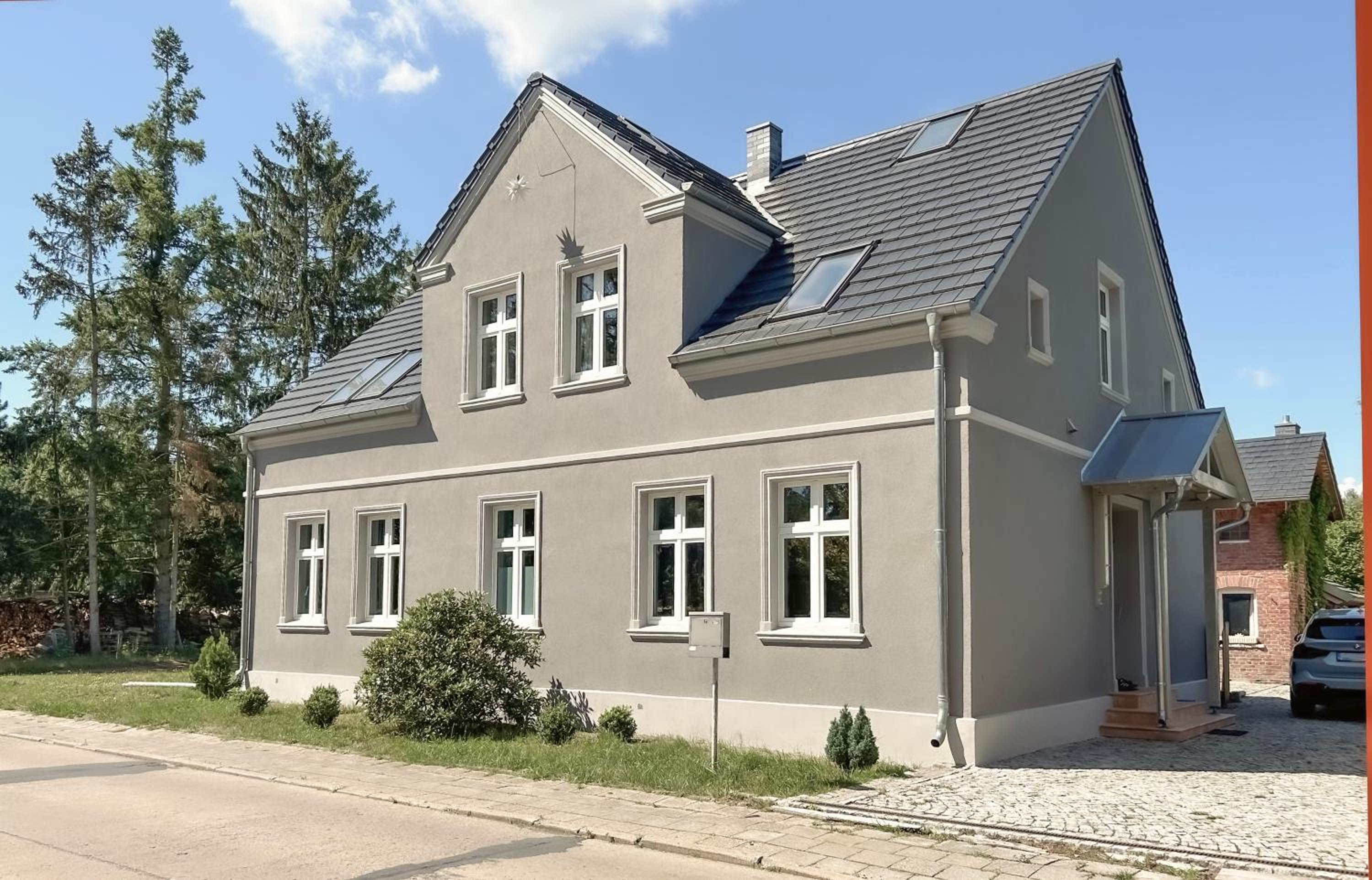 Landhaus hinter`m See Ferienwohnung Landliebe luxuriöser Wintergarten Kachelöfen