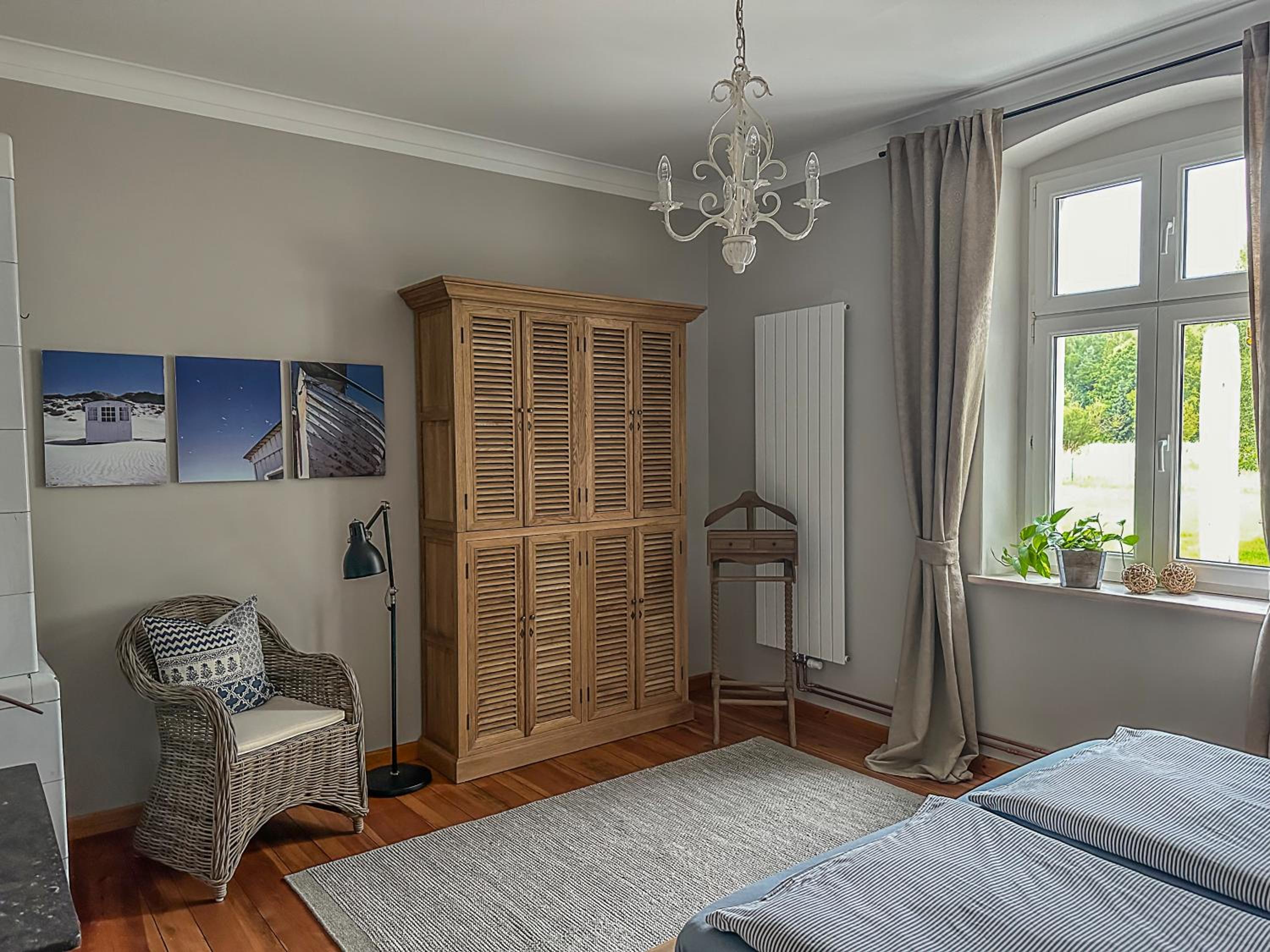 Landhaus hinter`m See Ferienwohnung Landliebe luxuriöser Wintergarten Kachelöfen
