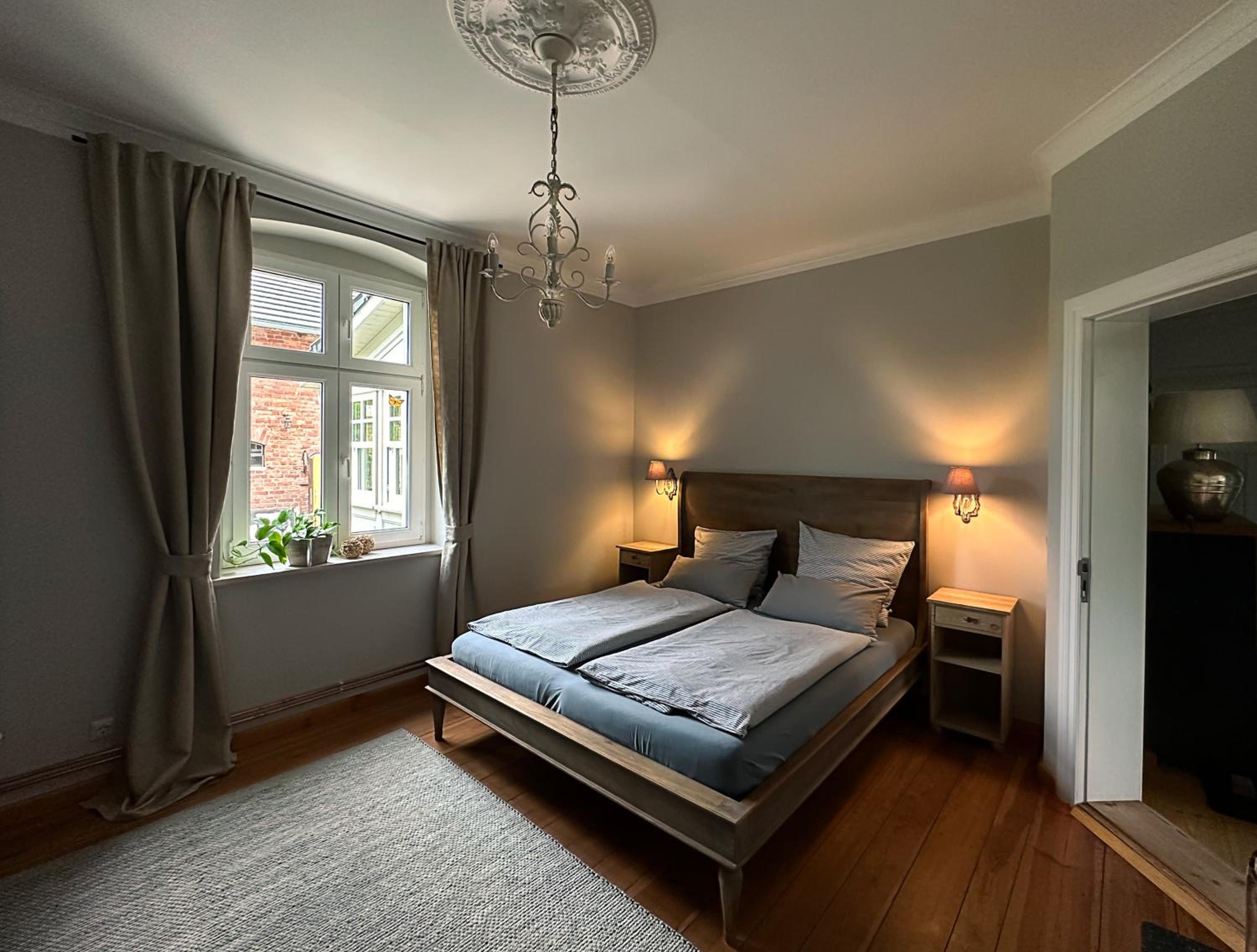 Landhaus hinter`m See Ferienwohnung Landliebe luxuriöser Wintergarten Kachelöfen