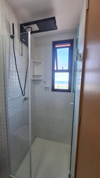 Apartamento com 2 suítes, varanda, vista mar, infraestrutura