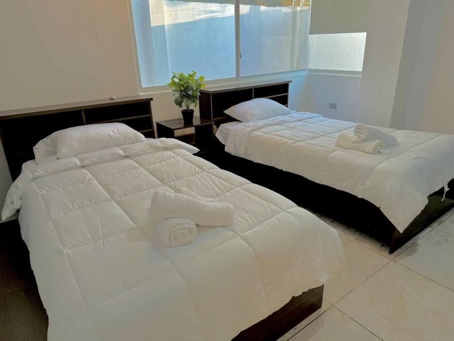 Dos dormitorios, zona hotelera
