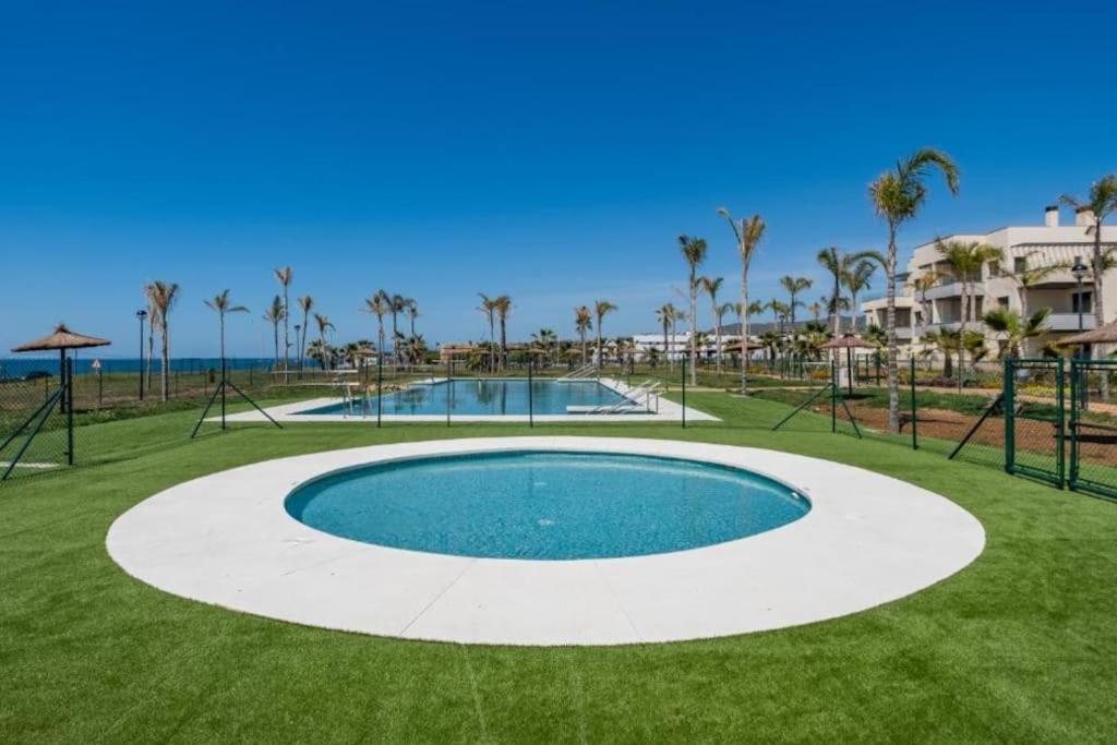 1º Línea de playa con piscina panorámica & parking
