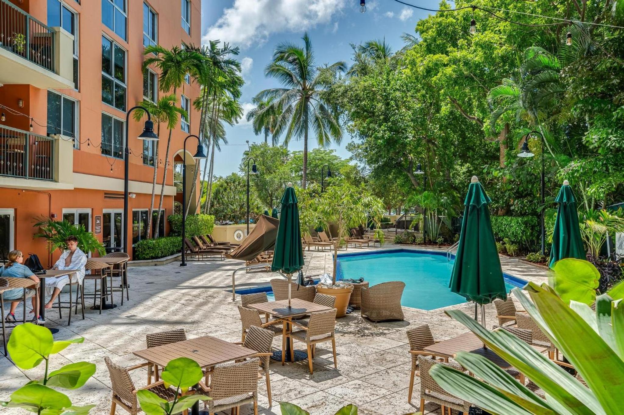The Palms Coconut Grove 1 bedroom condo includes parking