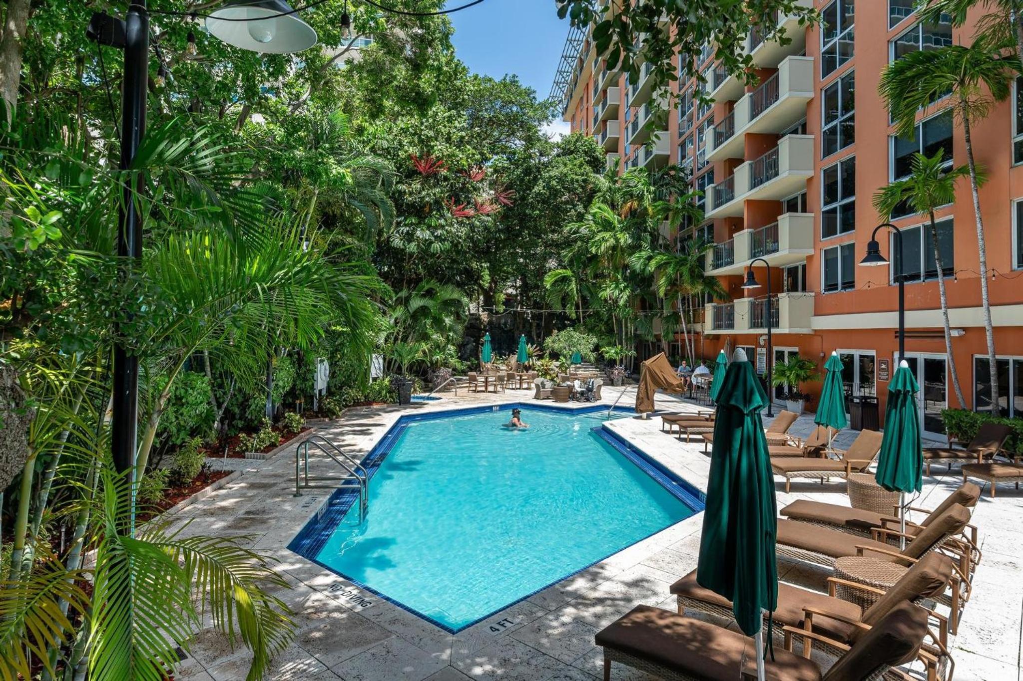 The Palms Coconut Grove 1 bedroom condo includes parking