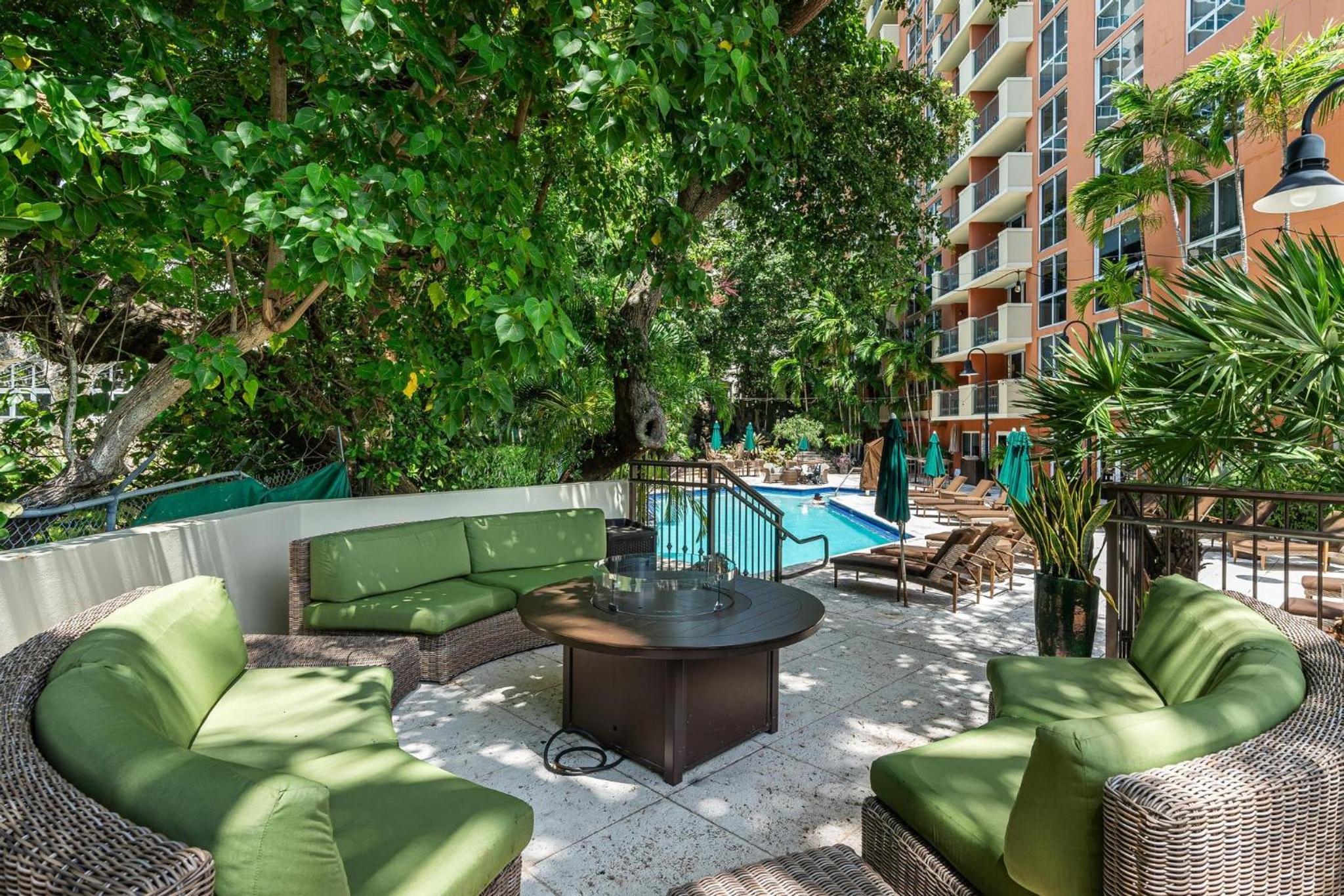 The Palms Coconut Grove 1 bedroom condo includes parking