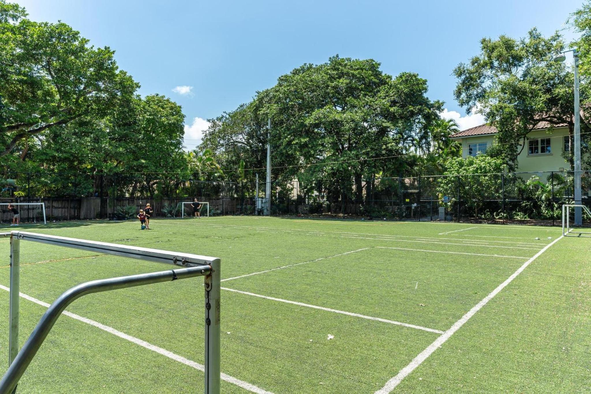 The Palms Coconut Grove 1 bedroom condo includes parking