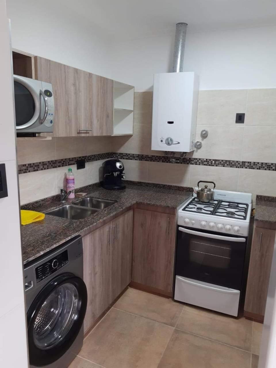 Departamento planta baja con garage, dos dormitorios