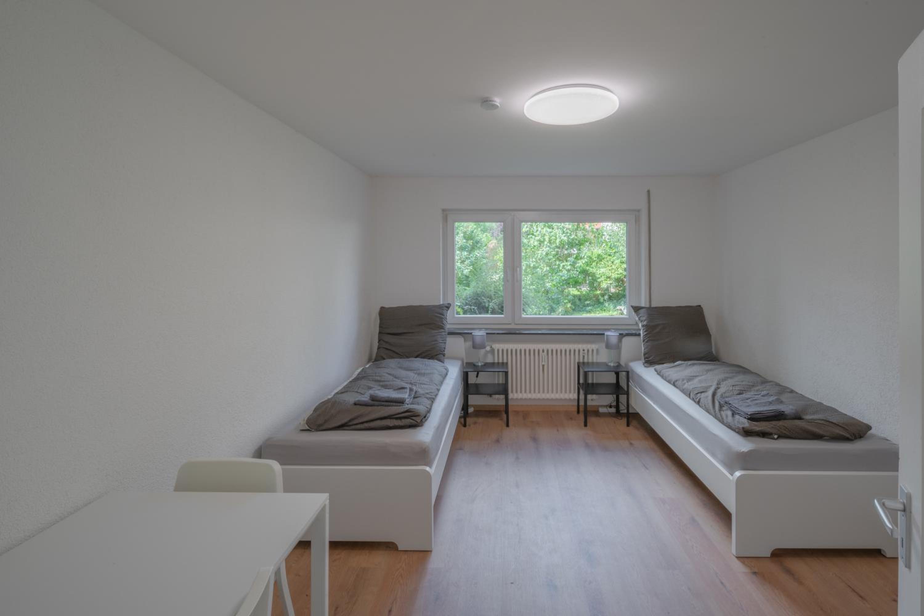 WORK&SLEEP Moderne Apartments in Villingen Schwenningen - Einzelbetten, TV, Bettwäsche & Handtücher, WLAN