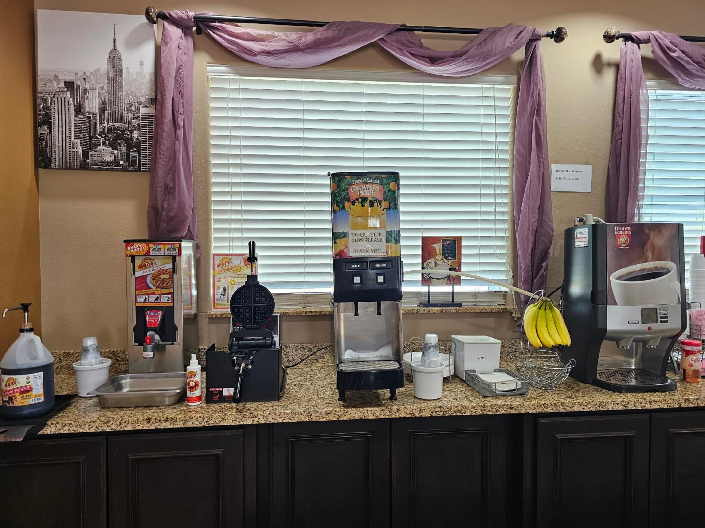 Executive Inn & Suites