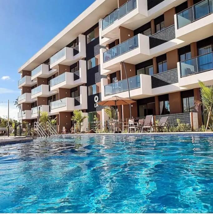 Flat em Muro Alto Porto de Galinhas com Piscina, Ar-condicionado e Cozinha Equipada