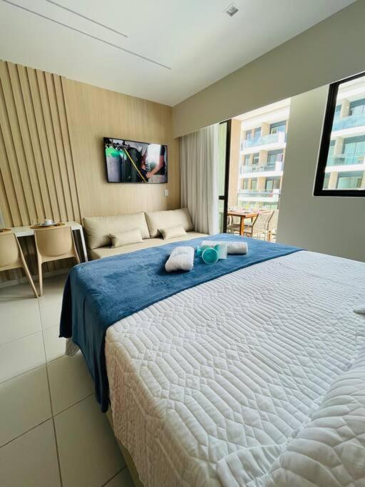 Flat em Muro Alto Porto de Galinhas com Piscina, Ar-condicionado e Cozinha Equipada