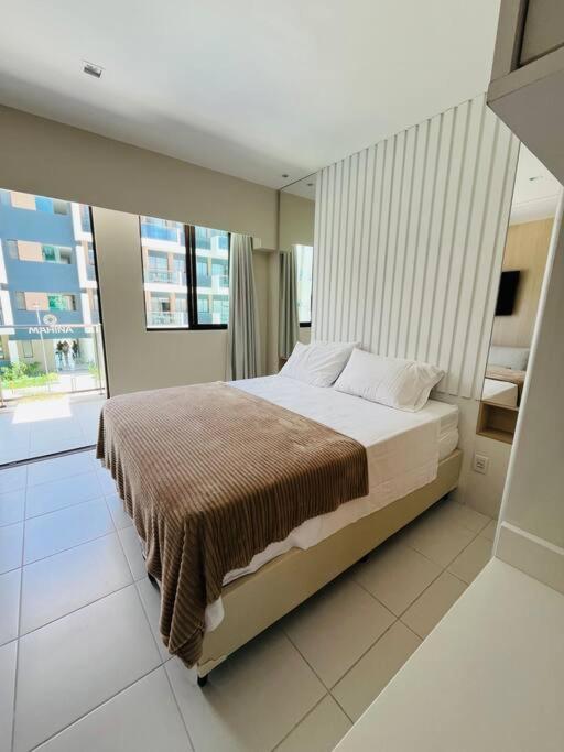 Flat em Muro Alto Porto de Galinhas com Piscina, Ar-condicionado e Cozinha Equipada