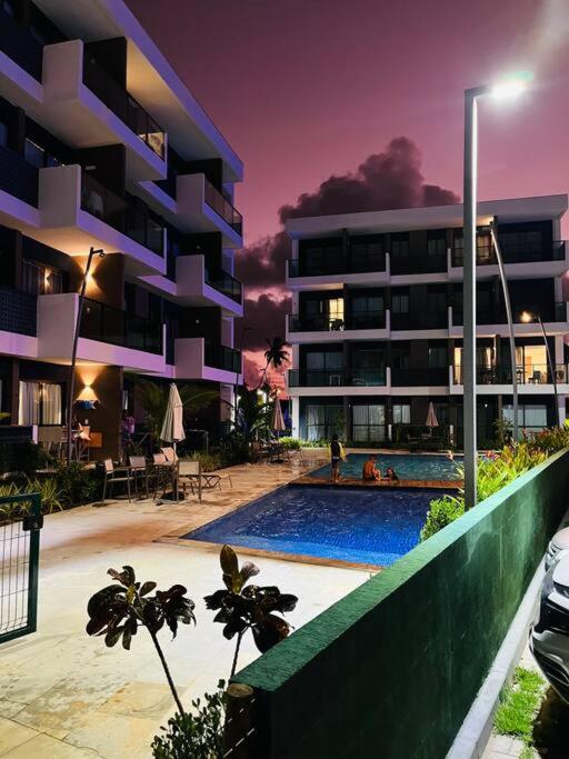 Flat em Muro Alto Porto de Galinhas com Piscina, Ar-condicionado e Cozinha Equipada