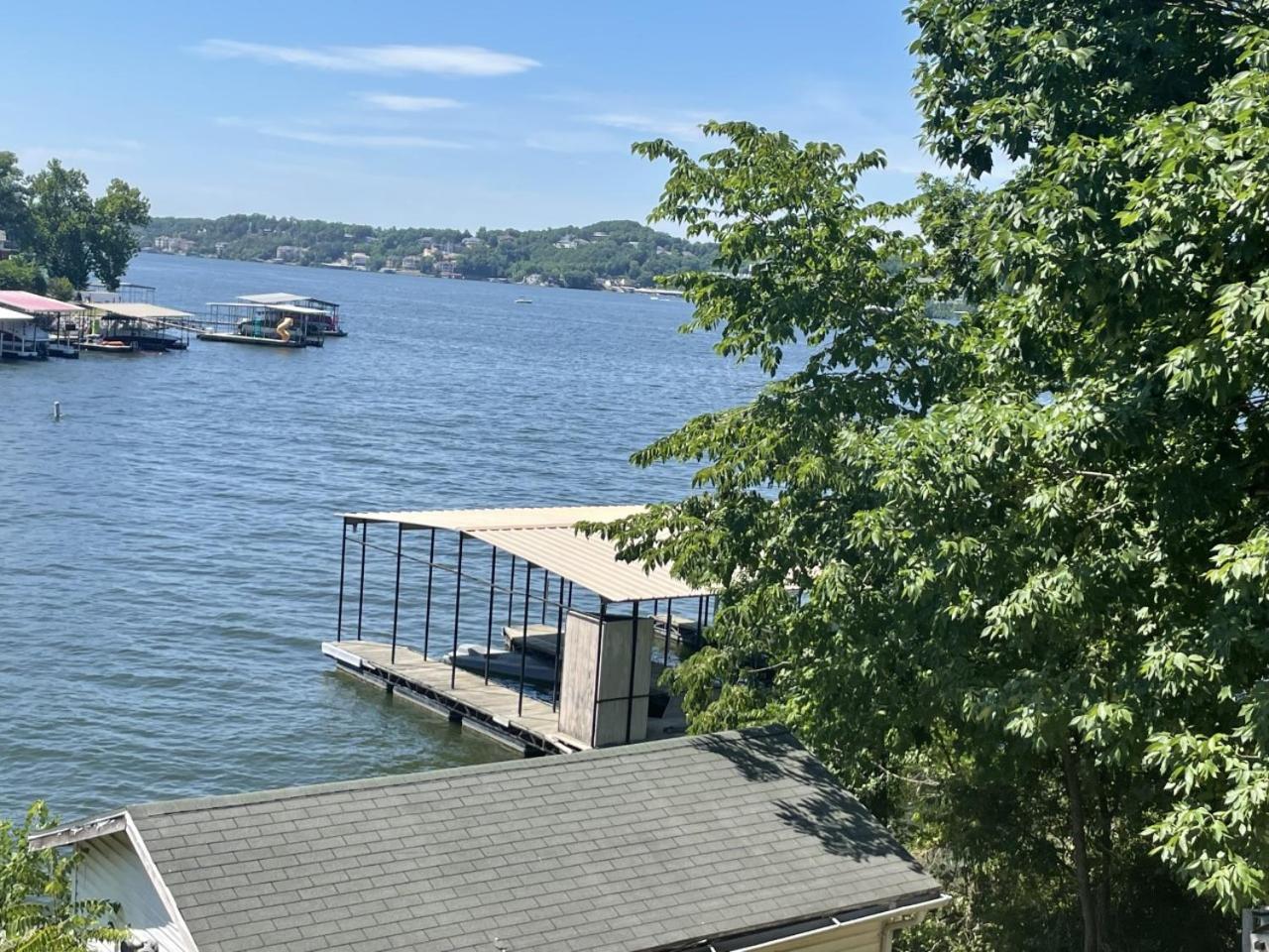 Cozy Cabin Lake Home dock slip and water toys view 2