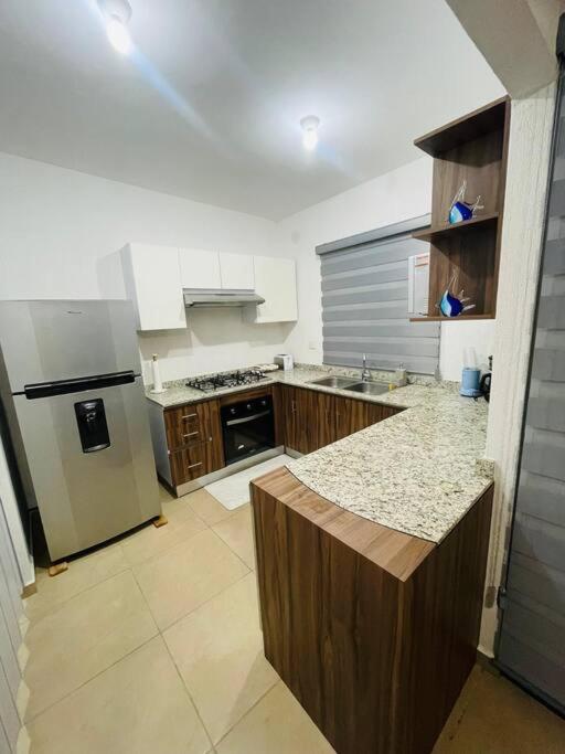 Maderos Residencial PentHouse and RoofTop