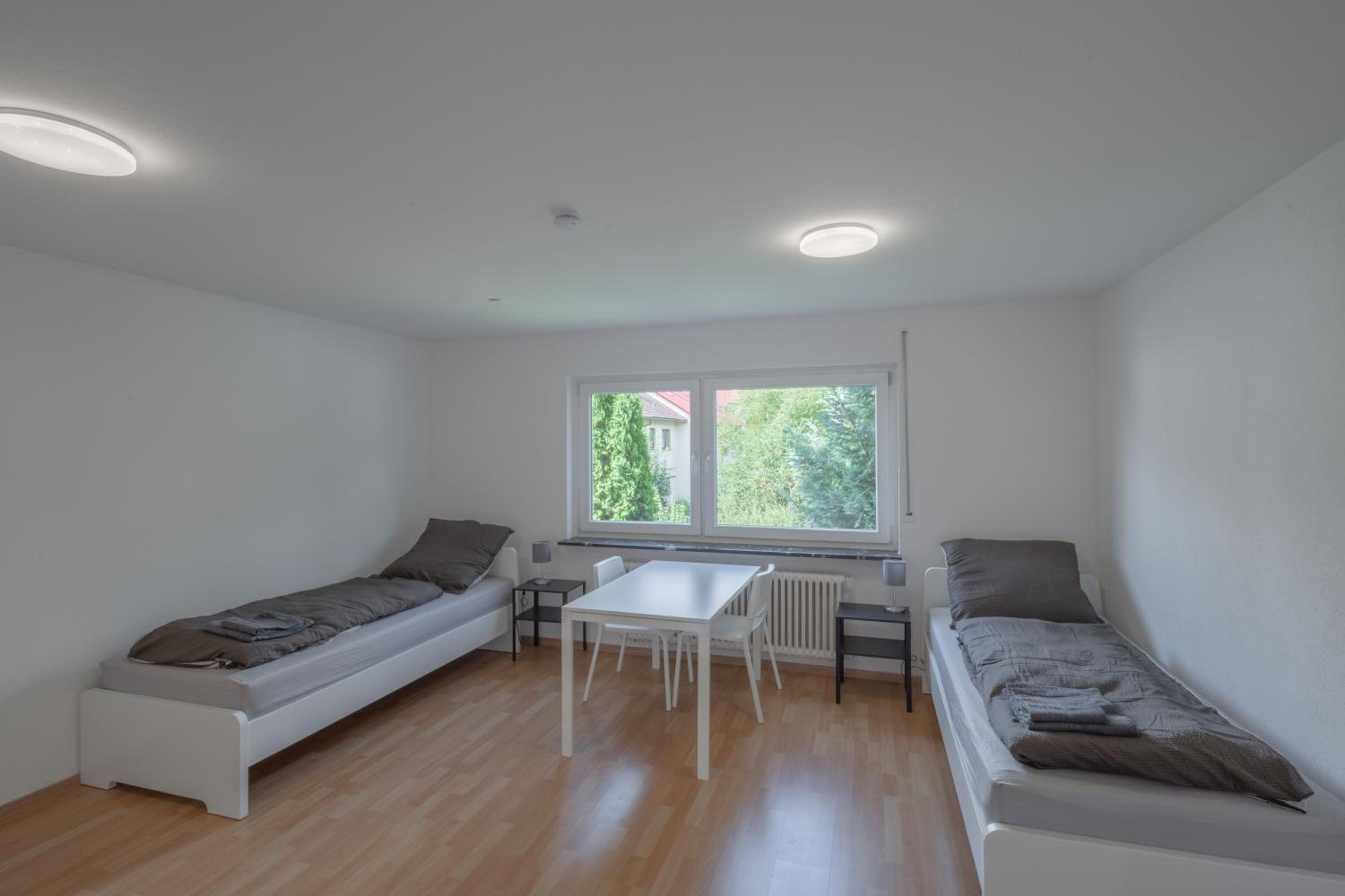 WORK&SLEEP Moderne Apartments in Villingen Schwenningen - Einzelbetten, TV, Bettwäsche & Handtücher, WLAN