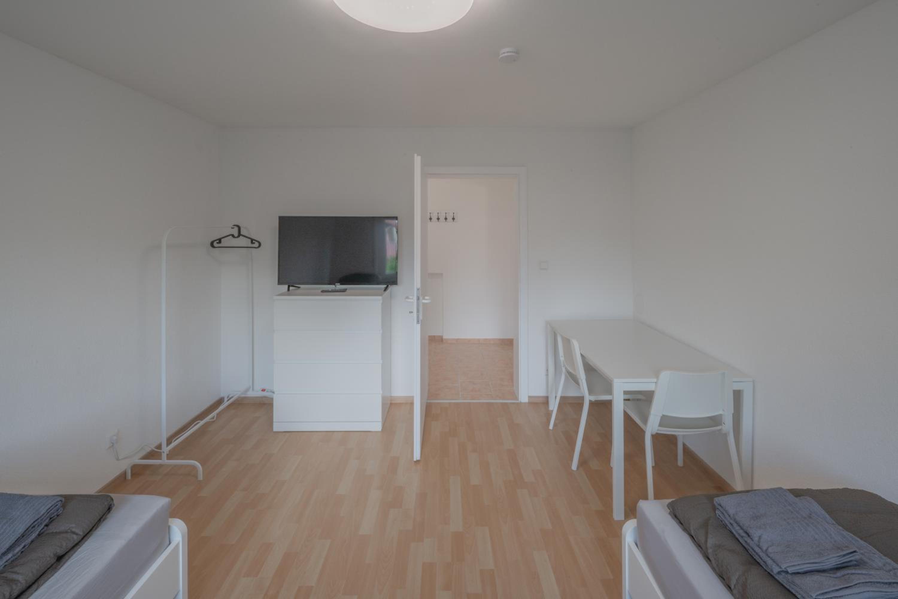 WORK&SLEEP Moderne Apartments in Villingen Schwenningen - Einzelbetten, TV, Bettwäsche & Handtücher, WLAN