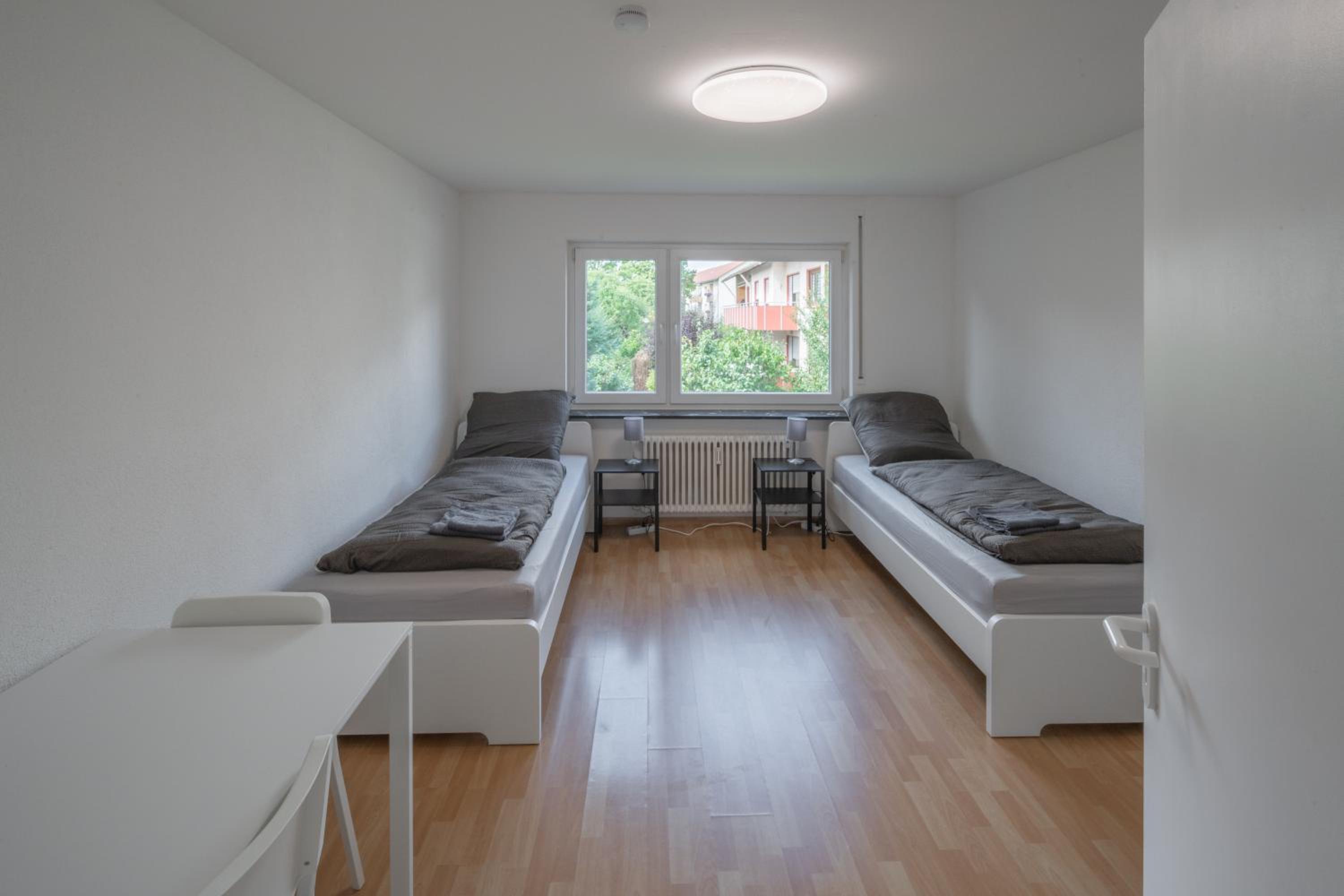 WORK&SLEEP Moderne Apartments in Villingen Schwenningen - Einzelbetten, TV, Bettwäsche & Handtücher, WLAN