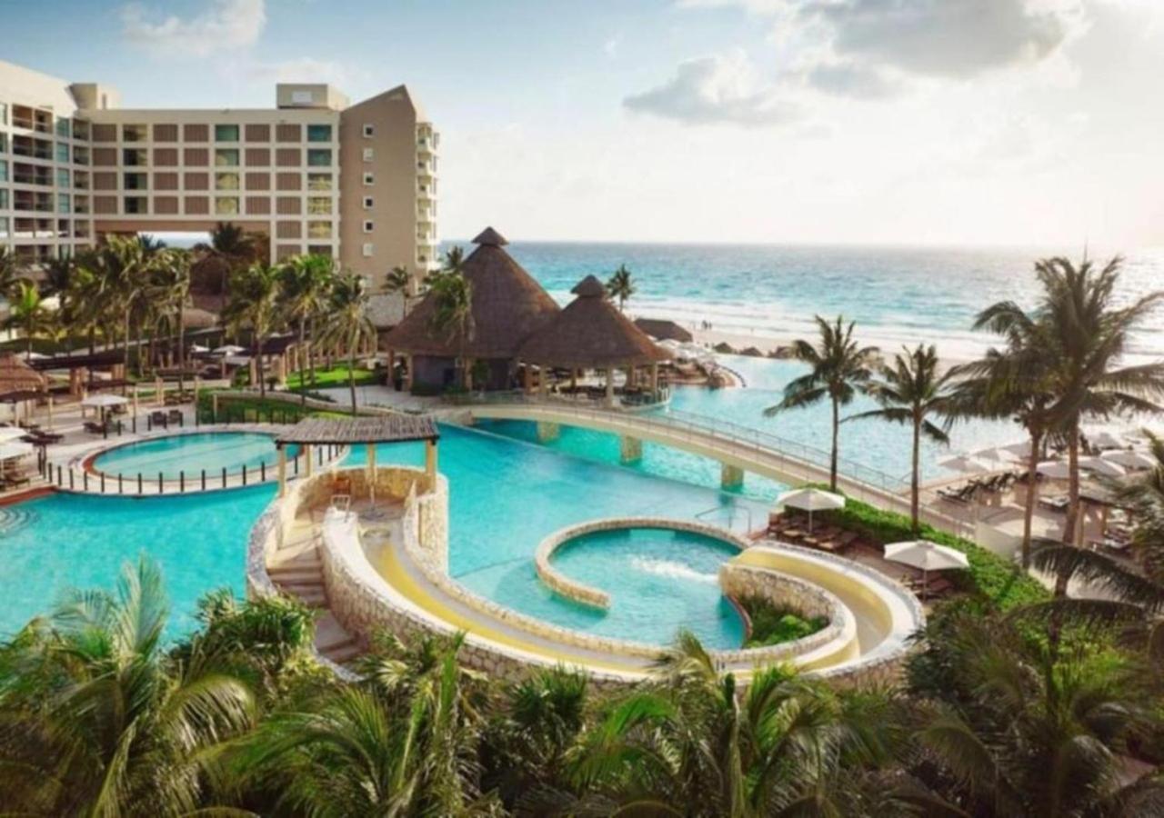 Enjoy the white sand resort beach in a 1BD vacation condo onsite infinity pool, spa, and mini golf
