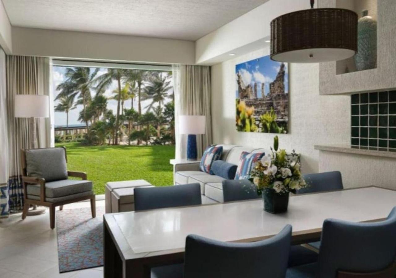 Enjoy the white sand resort beach in a 1BD vacation condo onsite infinity pool, spa, and mini golf