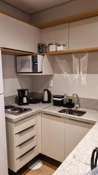 Ap em Canela com AC,lareira, piscina, garagem