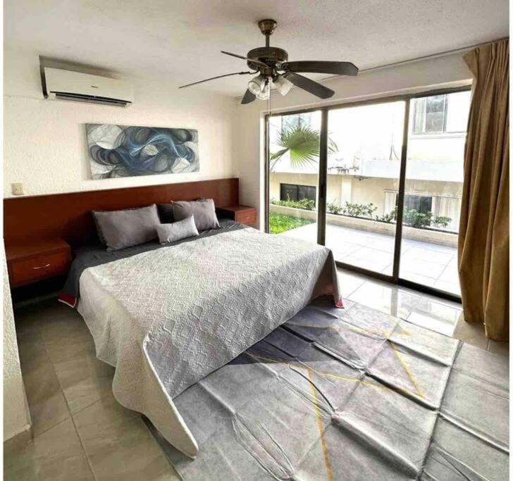 Exclusive Beachfront Apartment in the Hotel Zone - Tranquil and Central Location