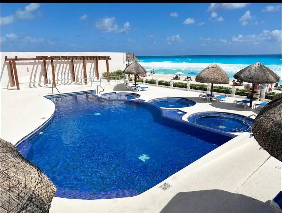 Exclusive Beachfront Apartment in the Hotel Zone - Tranquil and Central Location