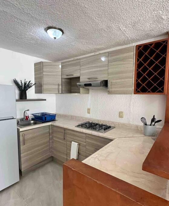 Exclusive Beachfront Apartment in the Hotel Zone - Tranquil and Central Location