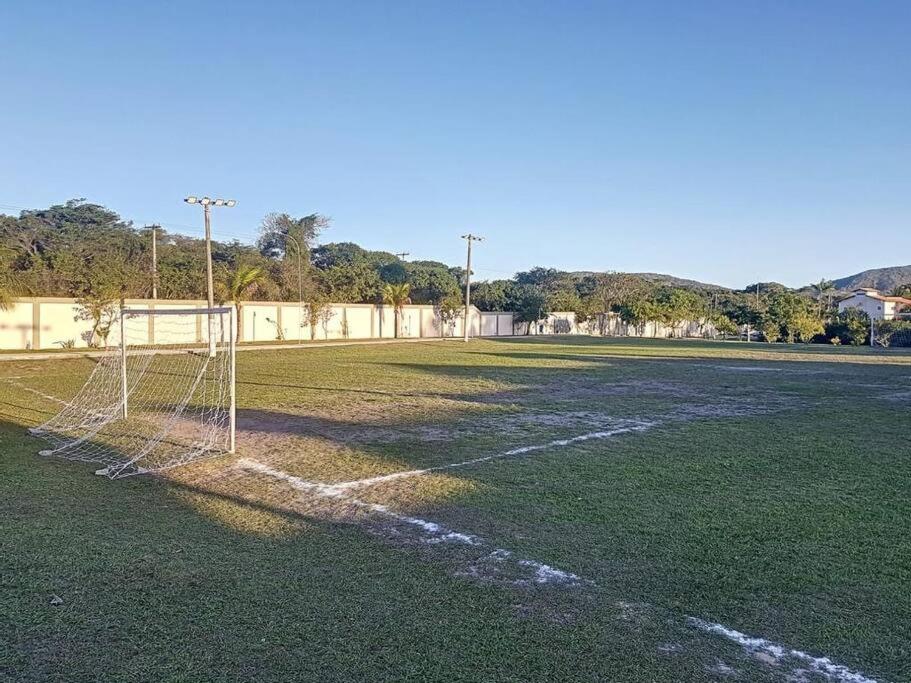 Casa com piscina, churrasqueira e ar condicionado em condomínio