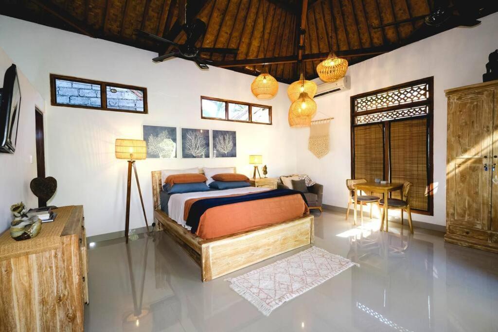 Indah puri Bali Bungalow on Candidasa beach view 3