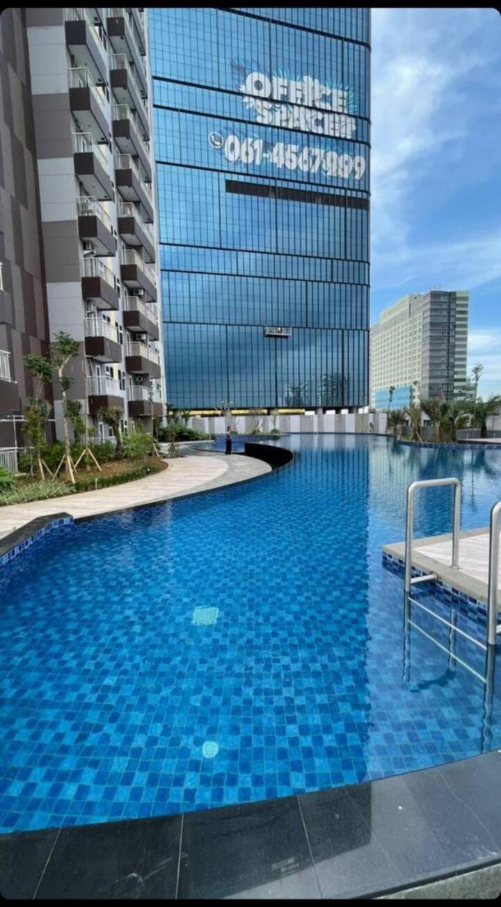 Spacious 2 King Bed Family Room 56 Sqm PODOMORO APARTMENT Tower Liberty 21st Floor with Mall Direct Access view 4