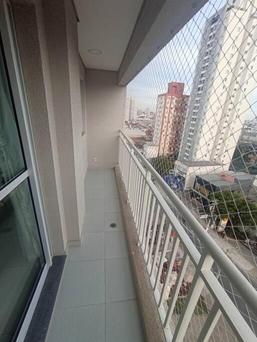 Flat 34m2 com varanda e 1 vaga de garagem - Avenida amador Bueno - Penha SP