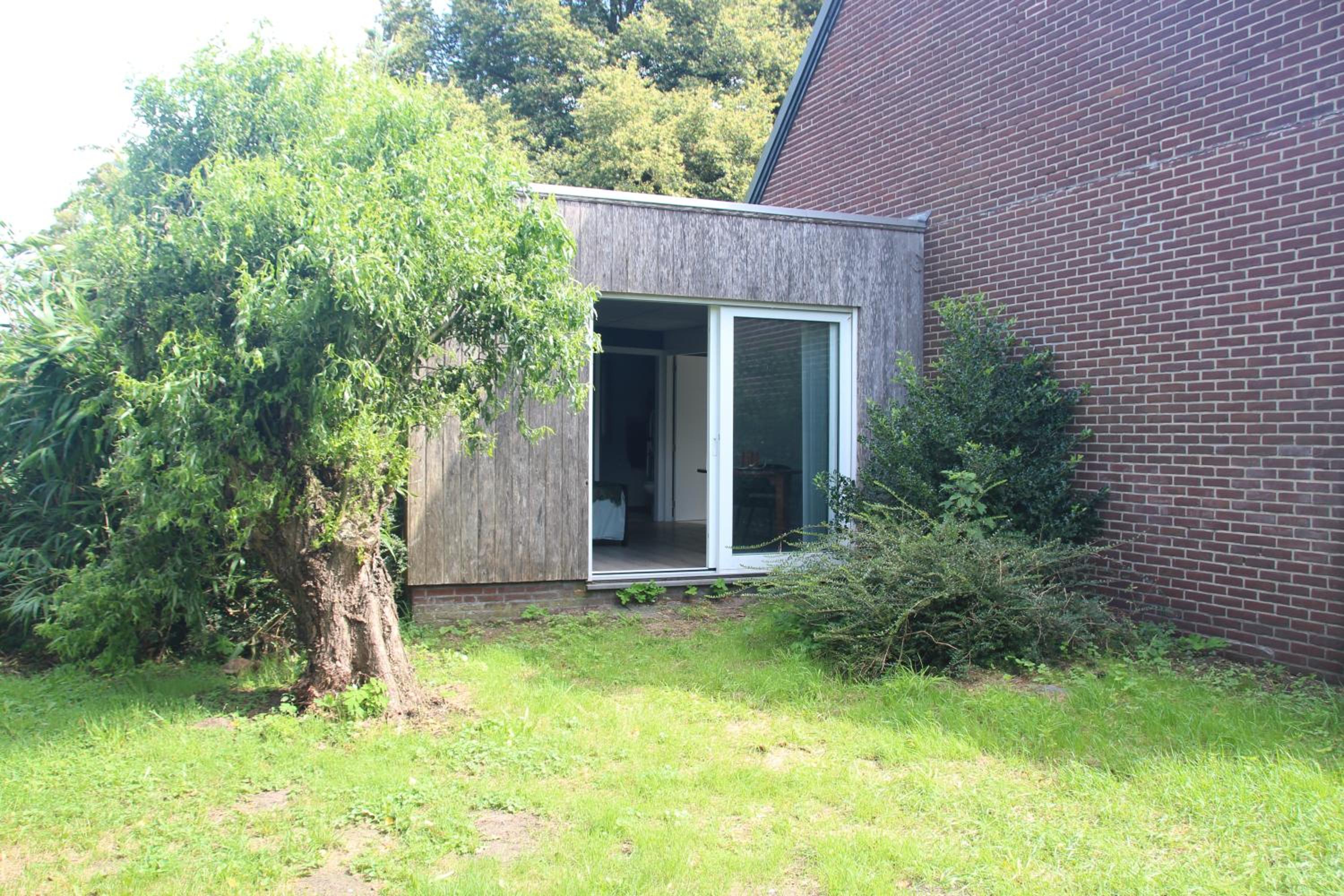 B&B Even Heukelom - Kamer met Tuin view 5