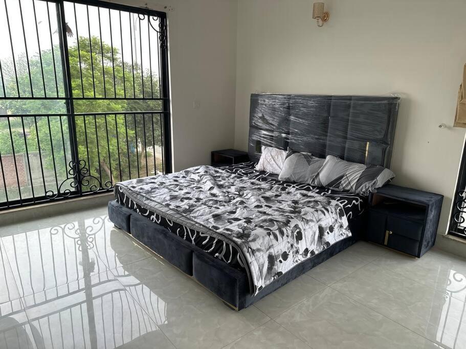 Comfort house Dha Phase 7 near Raya & AirPort 1 kanal full house view 5